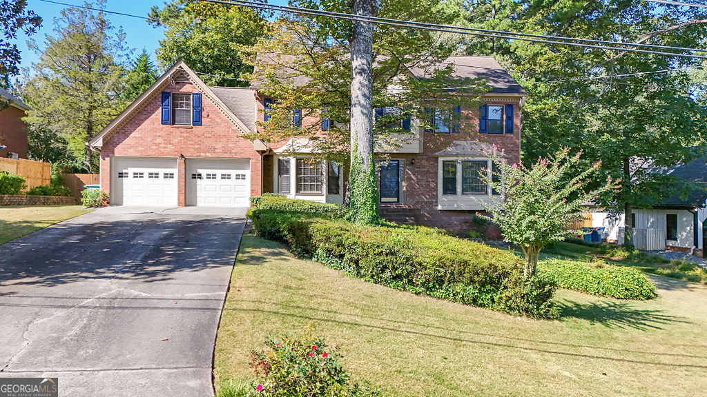 Beautiful 5-Bedroom Home in the Top-Rated Parkview High School District! This well-maintained home is filled with upgrades, charm, and an incredible landscaped yard featuring mature fruit trees - fig, apple, pear, peach, and blueberries - perfect for garden lovers. Inside, the updated kitchen showcases granite countertops, stainless steel appliances, custom maple cabinets, and plenty of storage - ideal for everyday living and entertaining. The main level offers a large formal dining room, a versatile living room/office, a cozy family room with a brick fireplace and built-in bookshelves that open to a screened porch, and updated half bath with new cabinets, tile, granite. Upstairs, the spacious primary suite easily accommodates a king-sized set and includes a walk-in closet plus a spa-like bath with new cabinets, tile, and granite. Four additional oversized bedrooms and another full bath (new cabinets, tile, and granite) complete the upper level. One secondary bedroom has a private stairway from the kitchen, making it perfect as a bonus room, office, or guest retreat. The level, fenced backyard is designed for fun and relaxation with an expansive deck, kids' play area, and a storage shed with electricity. Whether you're entertaining or unwinding, this outdoor space has it all! Cedar Creek offers an optional swim/tennis community and is conveniently located near trails, Downtown Lilburn, shopping, and top-rated Gwinnett County Schools. This home is a MUST-SEE!