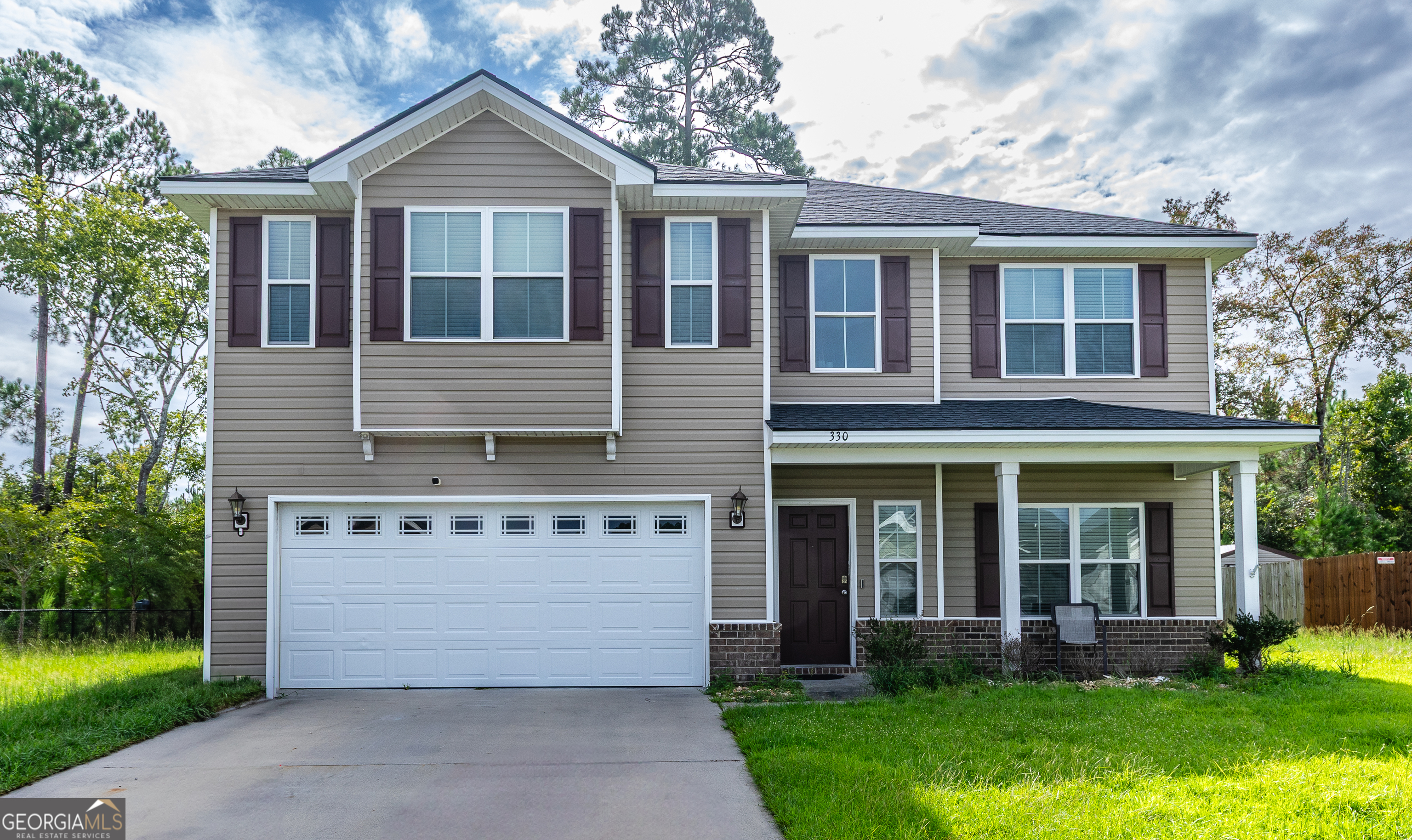 Stunning 4-Bedroom Home in Hinesville! Welcome to this beautiful, move-in-ready home built in 2020, offering an impressive 2,883 square feet of thoughtfully designed living space. Located in a desirable Hinesville neighborhood, this home features a two-car attached garage and modern finishes throughout. Step inside to a spacious living room that flows seamlessly into a bright breakfast area and a gorgeous kitchen with sleek cabinetry and stainless steel appliances-perfect for entertaining or everyday living. Enjoy meals in the formal dining room, highlighted by elegant wainscoting accents. A convenient half bath completes the main floor. Upstairs, discover four generously sized bedrooms and two full bathrooms. The luxurious master suite is a true retreat, featuring a huge bedroom, a private sitting room, two walk-in closets, and a spa-like en-suite with double vanities, a soaking tub, and a separate shower. The three additional bedrooms share a well-appointed guest bath, offering plenty of space for family, guests, or a home office. This home has everything your family needs-space, style, and comfort. Don't miss your chance to make it yours!