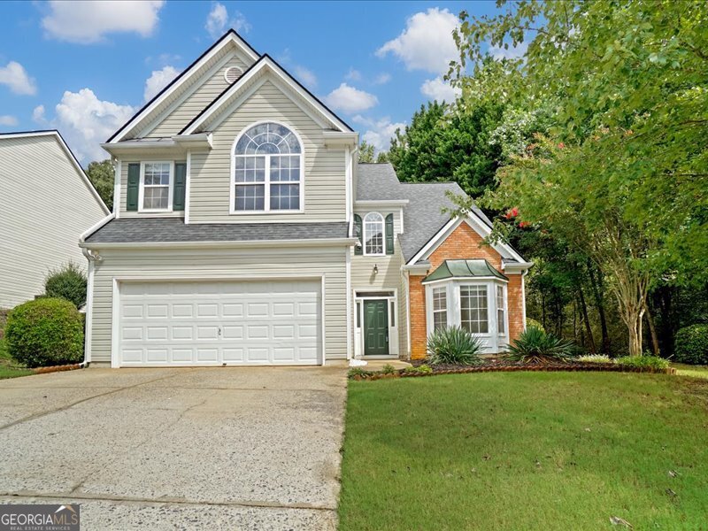Welcome to your dream home in the desirable Avensong subdivision of Milton, Georgia! This stunning traditional residence boasts timeless elegance with modern amenities, perfect for families and entertainers alike. As you step through the front door, you're greeted by beautifully maintained hardwood floors that flow seamlessly throughout the main living areas. The spacious living room and dining room feature architectural details that create an inviting atmosphere for gatherings or quiet evenings at home. The family room is the heart of the home, showcasing beautiful arched entries and ample natural light, making it the perfect spot for relaxation or family movie nights. Nestled on a large, level lot, this property offers an oasis-like feel with a private, fenced backyard-ideal for kids and pets to play freely. Step outside onto the expansive party deck, perfect for hosting summer barbecues or enjoying morning coffee surrounded by nature. The covered meat smoker area is a barbecue enthusiast's dream, ready for you to create culinary masterpieces and entertain friends and family in style. Situated in the highly sought-after Milton community, you'll enjoy top-rated schools, lush parks, and a strong sense of community living. Explore the nearby walking trails, boutique shops, and dining options, or embrace the peaceful suburban lifestyle that Milton has to offer. Don't miss this incredible opportunity to own a piece of paradise in Avensong. Schedule your private showing today and start creating memories in this beautiful traditional home!