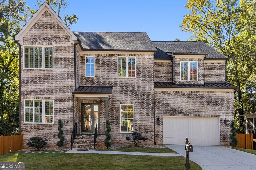 Historic Brookhaven*, with occupancy permit issued in May 2025, offers a prime opportunity to own new construction in the coveted Brookhaven Walkway community. This residence blends tradition with modern sophistication, boasting a prime location and exceptional craftsmanship. This stunning seven-bedroom, four-sided brick residence features meticulous design, luxurious finishes, and oak flooring throughout. The open-plan main floor, with 12-foot high ceilings, a spacious living room, and exquisite finishes, creates a warm and inviting atmosphere. The chef's kitchen boasts custom cabinetry and premium appliances. A custom-built wine cabinet is ideal for storing and displaying a wide selection of fine wines. Abundant storage and an oversized shoe closet provide convenience and comfort for everyday living. Stepping out onto a spacious covered patio with a modern fireplace, it's ideal for year-round leisure and viewing.    This residence boasts seven bedrooms, all with custom-designed closets, six bathrooms (five showers, one with a tub), and two half-bathrooms. The oversized second-floor master bedroom features a large soaking tub and ample closet space. A spacious laundry room includes new, high-end washer and dryer appliances. With meticulous attention to detail, premium materials, and a thoughtfully designed floor plan, this residence will inspire pride of place.    The luxuriously finished, light-filled basement boasts 10-foot high ceilings and a spacious living room, perfect for grand receptions or intimate gatherings. A spacious theater provides ample entertainment. Step outdoors to the large, flat, resort-style backyard, where a lush lawn evokes the essence of nature, creating an idyllic setting for relaxation and even the prospect of building your dream pool.    Every detail of this residence exudes sophistication, offering a lifestyle characterized by elegance, comfort, and excellence, all just steps away from the restaurants, boutiques, and community bustle of Brookhaven Village. This truly represents exceptional value.