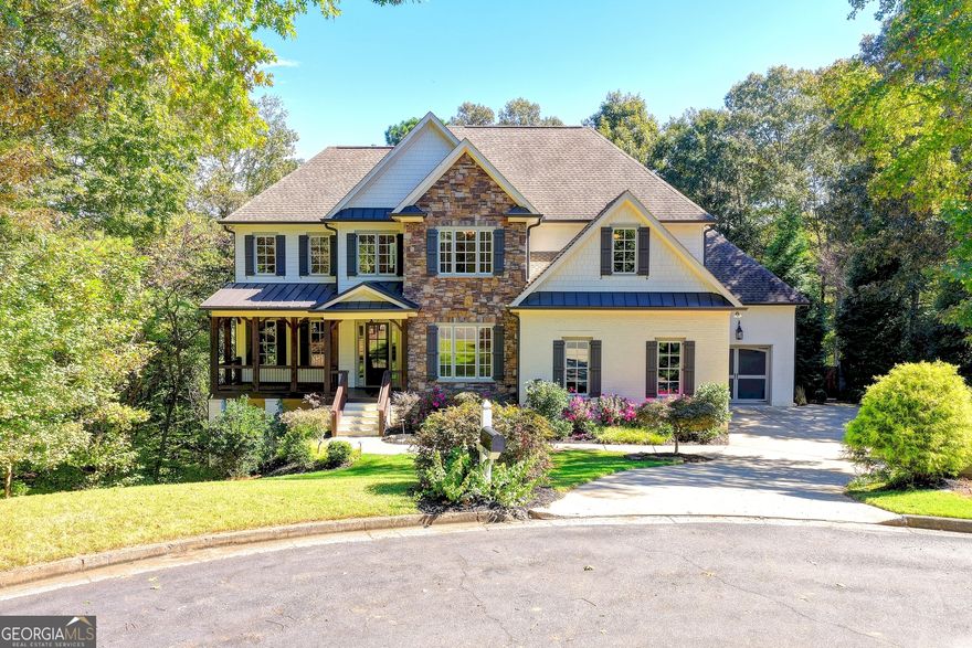 YOUR AWARD WINNING GARDEN & GUN RIVER LIFESTYLE DESIGNER ESTATE ON 2+ ACRES with Saltwater pool & spa awaits! Be sure to scroll down for the VIRTUAL TOUR! Cul-de-sac lot bordering ACRES of unbuildable greenspace and the Chattahoochee River! FINISHED TERRACE LEVEL. 3 CAR GARAGE with charging option! FRESH PAINT, REFINISHED FLOORS, MOVE IN READY! Fishing pond access from the property! Stone, brick, cedar and wood come together in custom craftsman artistic detail for this 2015 completely custom southern dream oasis built exclusively by Callaway Custom Homes. Combined open shelving and closed furniture quality cabinetry in the kitchen. Chef inspired pro stainless appliance package, wine rack, oak flooring throughout, industrial country french accents and completely designer selected unique one of a kind lighting.  Classic white carrera marble counters and granite vanities throughout. Cedar and brick interior accents.  The estate is adorned with custom millwork throughout and custom sliding doors! From entry paneling to the living room, to solid shiplap in the family room, kitchen and terrace level.  PORCHES!  Front covered porch, back screened porch flowing to completely private BBQ deck!  The Owner's Suite is a complete oasis with full sitting room, endless green forest and pool views, and a spa inspired marble bath that is a true retreat. Claw foot iron and pewter soaking tub with coordinating hardware, furniture inspired double vanities and brushed gold lighting. Walk in closets throughout the home, built in shelving throughout, and unique architecture.  Each bedroom has full bath access.  The home features a FULL spacious bedroom on main level with full bath ensuite.  The terrace level features second kitchen custom bar and 6th bedroom ensuite with palatial ceilings and custom built in finishes.  The terrace is accented with brick, custom metal bar with wood and shiplap.  The media room spares no detail with brick and industrial chic lighting.  The home features a 2015 custom salt water infinity pool and hot tub surrounded by stone planters and pavers, and is one of a kind and features a stacked stone masonry wood burning fireplace. It does not stop with the home...the community is a River Club oasis of nature equestrian trails, river access, equestrian boarding facilities with active riding programs nearby, swim, tennis, pickleball, baseketball, amphitheater, park and local golf course!  Convenient walking access to the local award winning charter elementary and middle schools! You can walk to Lake Lanier and the Buford Dam from community trails.  The community neighbors the Trout Hatchery and Wildlife Nature Center for the Chattahoochee River, with immersion into nature as a lifestyle.  Cue the deer and rabbits, they are part of the community.  **Details indicated to be verified by buyer**