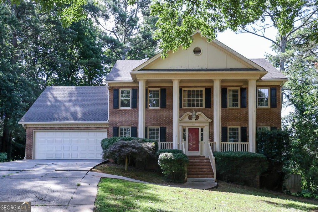 Photo of 4128 Mayflower Court SW, Lilburn, GA 30047 (MLS # 10792391)