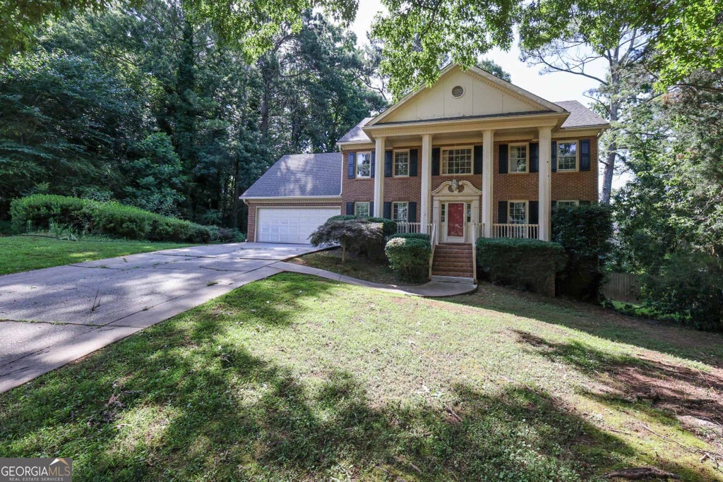 Photo of 4128 Mayflower Court SW, Lilburn, GA 30047 (MLS # 10792391)