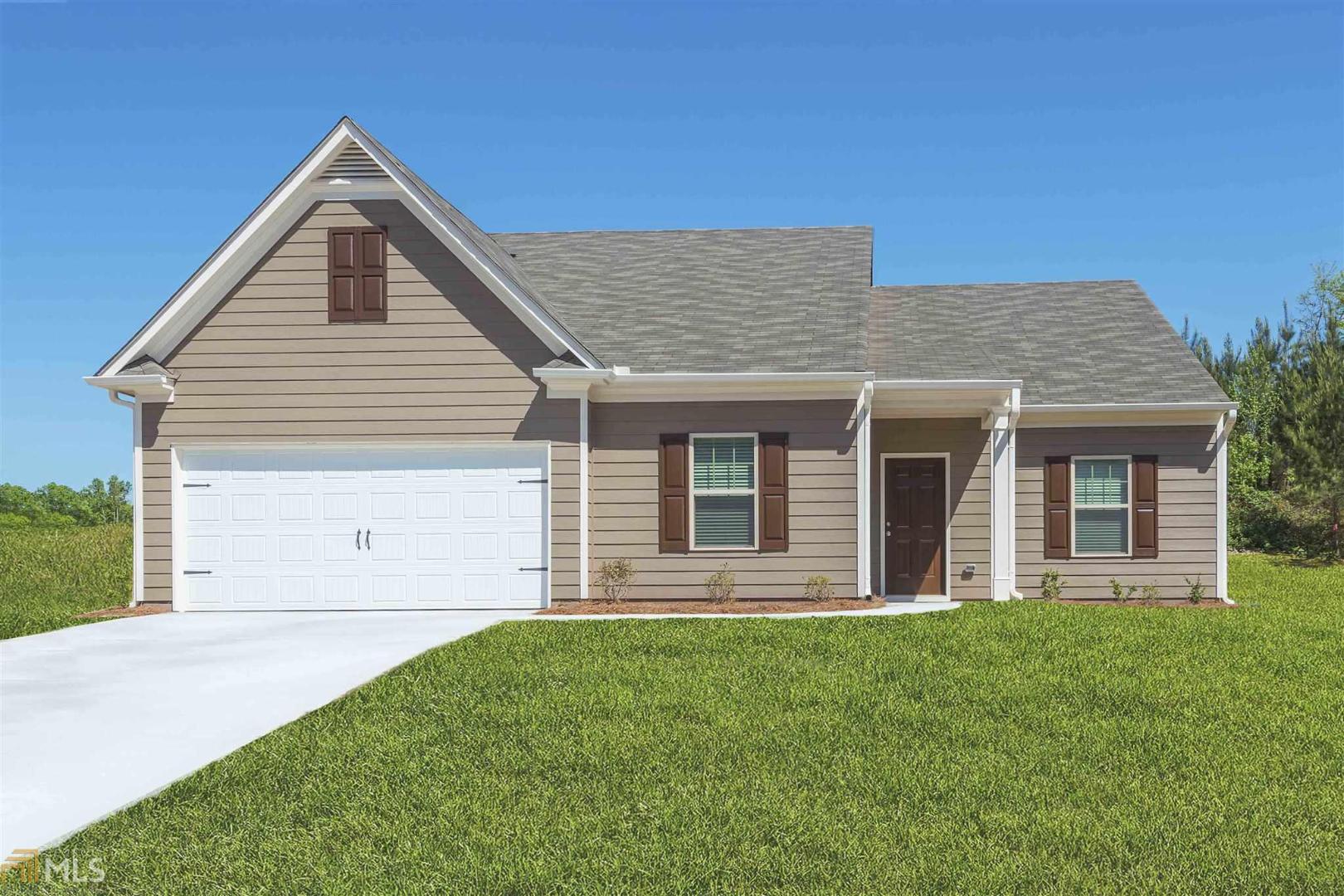The delightful Dockery plan from LGI Homes has all the makings of a dream home come true, with its amazing lineup of interior and exterior features. This 4-bedroom, 2-bath home showcases a split-bedroom layout, with a spacious, open kitchen and large family room situated at the heart of the home, separating the master suite and secondary bedrooms. A fourth bedroom situated toward the front of the home could serve as an optional study. The Dockery is offered at Ashley Meadows, LGI homes' community of new homes east of Atlanta in historical Covington, GA.