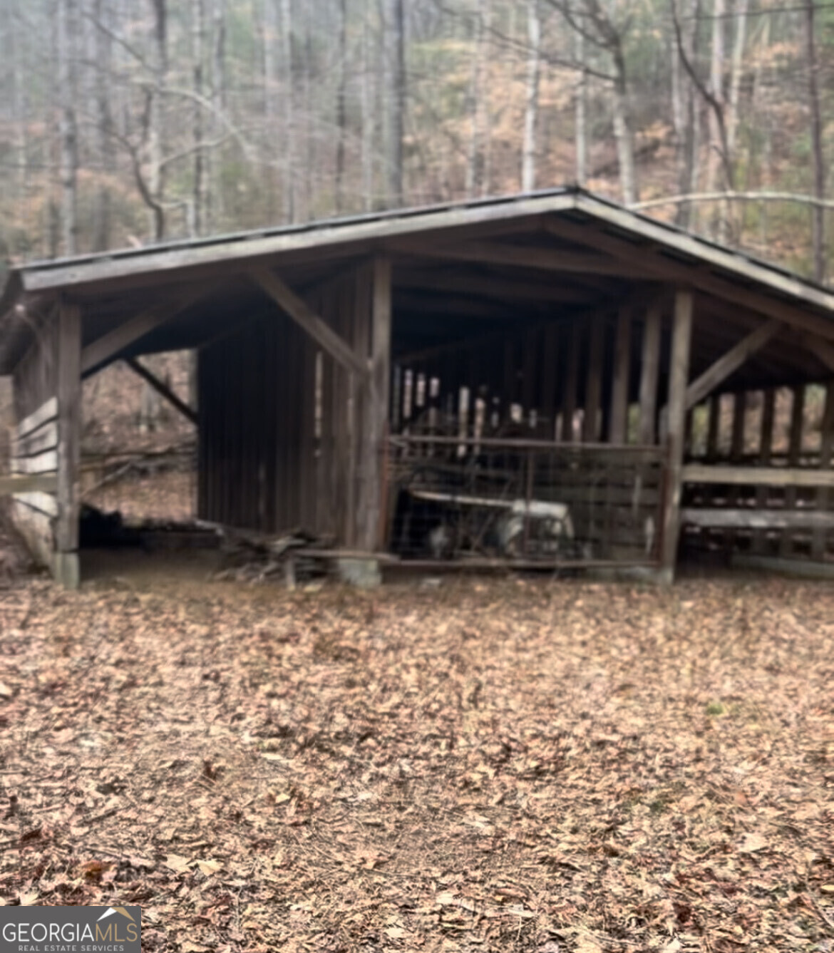 Discover the perfect opportunity to build your dream mountain home on this 5-acre slope land lot, offering stunning panoramic views and a peaceful, serene setting. With ample space for outdoor living and a charming old barn ready for renovation or creative transformation, this property provides rustic character and endless potential. Located off Permission Creek Road, it combines privacy and tranquility with convenient access to nearby amenities. Whether you envision a cozy retreat or a luxurious mountain estate, this lot is ideal for creating your perfect mountain sanctuary. Don't miss out-schedule your visit today and start building the mountain dream home you've always imagined!