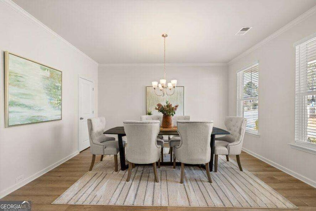 Photo of 1089 Georgian Point Dr, Lawrenceville, GA 30045 (MLS # 10662043)