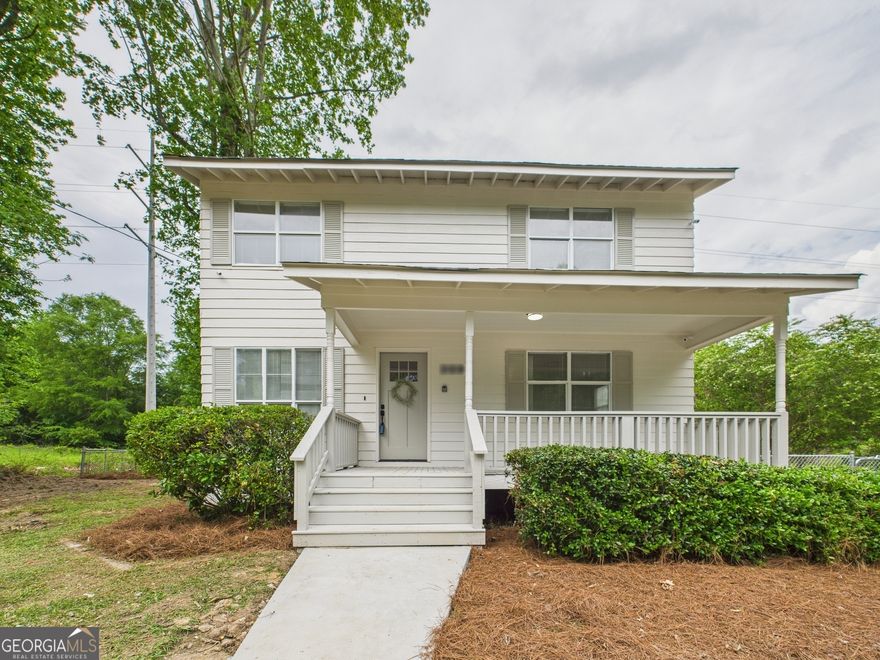 Welcome to this beautifully revitalized 2-story home nestled just minutes from dining, shopping, and all the conveniences Macon has to offer. Featuring 4 spacious bedrooms and 2.5 baths, this move-in ready gem offers the perfect blend of comfort and style.    Step inside to an open-concept living space that flows effortlessly into a bright galley kitchen-perfect for entertaining or cozy family dinners. Enjoy morning coffee on the charming front porch and unwind in the evenings on the back porch overlooking a spacious, fully fenced backyard-ideal for pets, play, or gardening.    Upstairs, you'll find a generous master suite complete with his and her closets and a private bath. With a brand-new front door, plenty of natural light, and great curb appeal, this home checks all the boxes.    Don't miss your chance to own this delightful property in one of Macon's most convenient and welcoming neighborhoods!