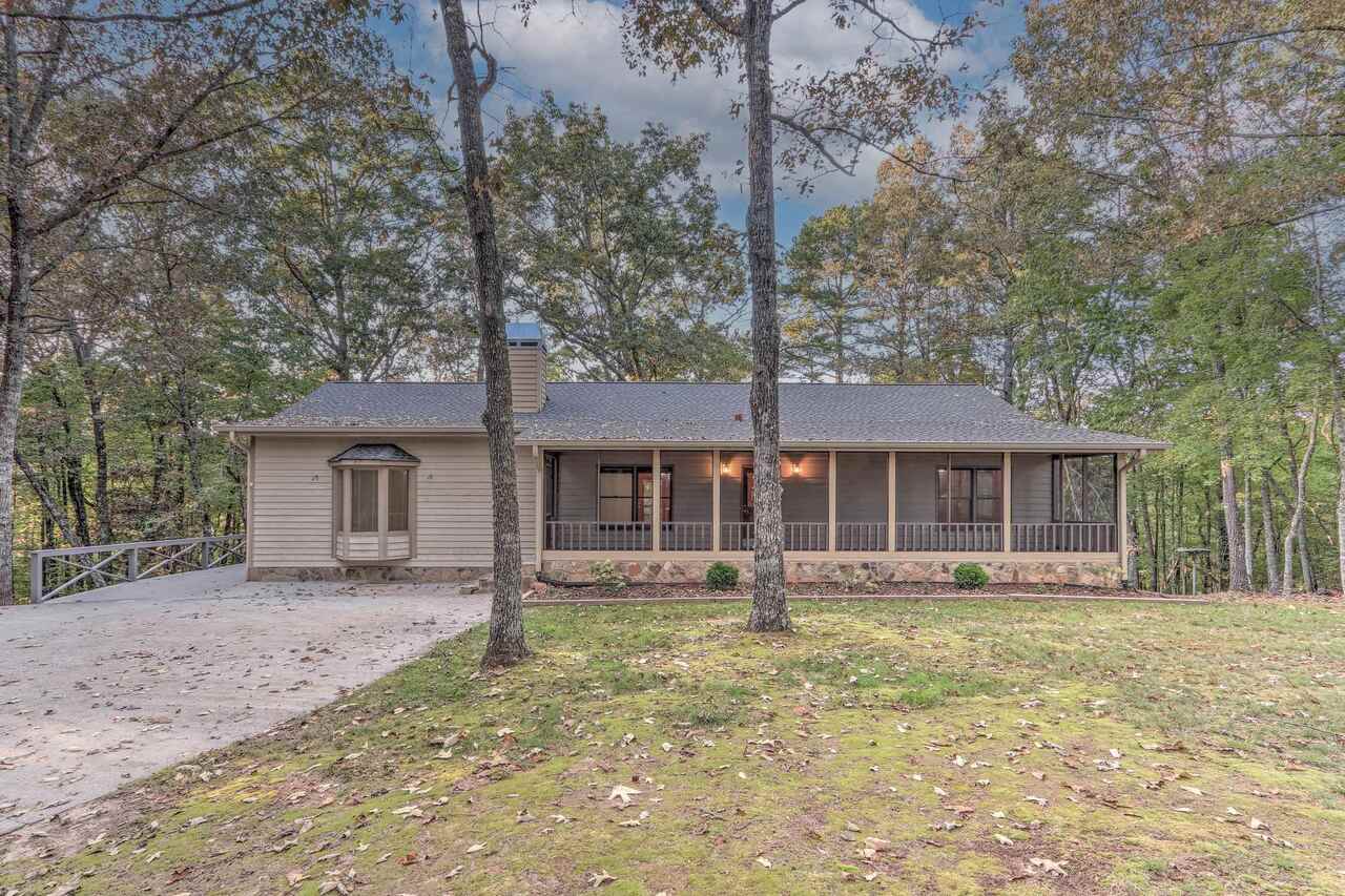 RARE ranch level home on a level lot accessed by a paved road. Located between Lakemont and Clayton off old 441. Over 2 acres without steep slopes. Separate drive to the terrace level garage. Plenty of parking in front of the house on paved parking pad. Room for a treehouse or a swing set or just for tinkering. Very few Restrictions . NEW ROOF INSTALLED JULY 2021- LIFETIME warranty is transferable, GAF Timberline HDZ shingles. 4 Bedrooms/3 full baths. Owners' suite has a fireplace, big walk in closet and a large bath. Double vanities. Garden Tub and separate shower. Open floor plan so the cook can mingle with family and friends while in the kitchen. Large finished room on the terrace level is a perfect playroom or home theater. Call now to see this great house in a quiet location with easy access to 441. Can be shown with no notice. Set through Showing Time or call agent directly.