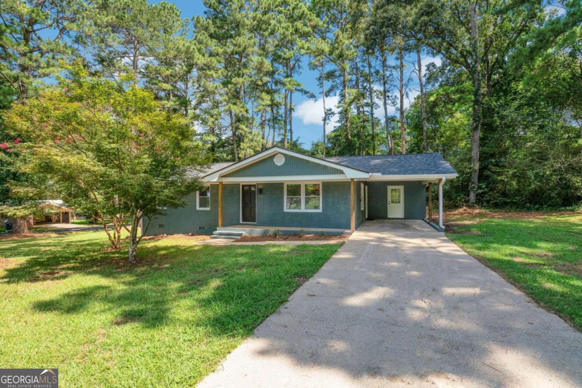 Welcome to this fresh and bright, fully renovated home in Winder.! No stone left unturned in this easy one level living home with carport and covered front porch. Solid brick home with new construction including new roof, all systems (HVAC including ductwork, plumbing and electrical hot water heater), flooring, lighting, smoothed ceilings and recessed lighting, crawl space insulation, and all appliances and cabinetry. Absolutely gorgeous kitchen with Quartz countertops, stainless steel appliances, breakfast bar, and lots of countertop space! - perfect that Chef enthusiast Tons of cabinet space also! Laundry closet in kitchen. View to backyard from kitchen sink. Perfect yard for children and pets with backyard patio. Beautiful Master with sparkling bathroom including walk in shower and quartz countertop vanity with plenty of space for personal items. Secondary bath in hall with tub shower combo. You don't want to miss your opportunity to have your brand-new home in established neighborhood at a incredible price! Hurry- this one is not going to last long!