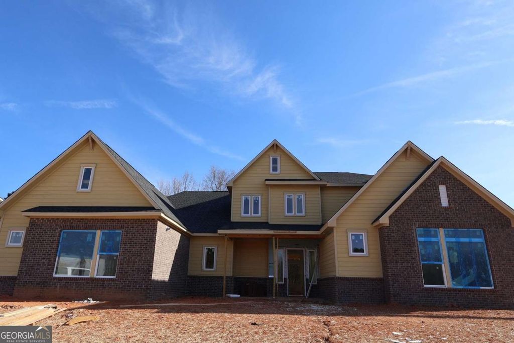 Photo of 7425 Magnolia Crest Ln, Cumming, GA 30028 (MLS # 10696935)