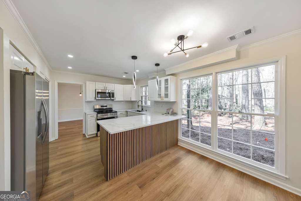 Photo of 5112 Rocky Glen, Stone Mountain, GA 30088 (MLS # 10704938)