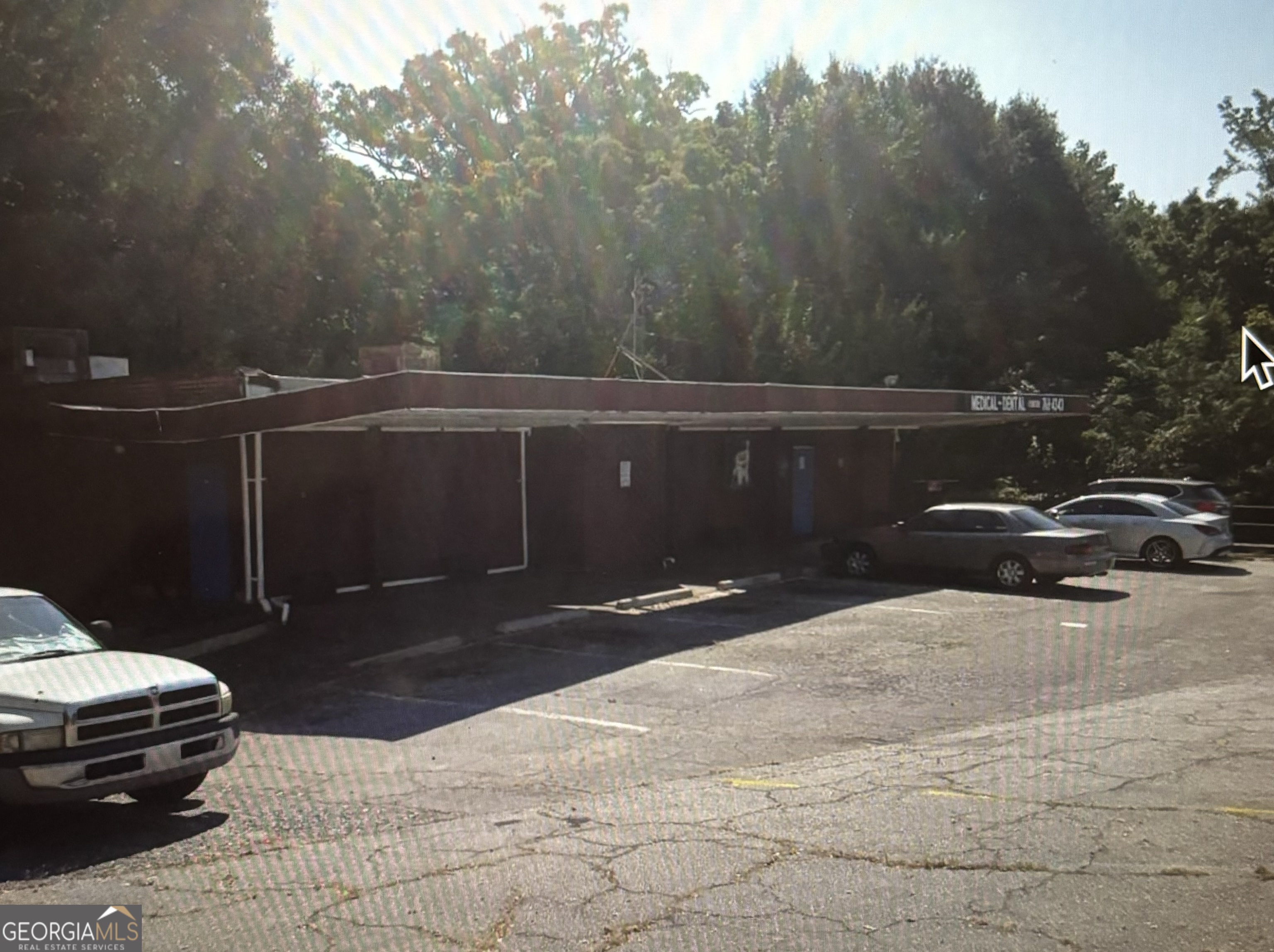 AS IS commercial standalone building in need of TLC. Great in town location. Drastically reduced Sellers eager to sell.