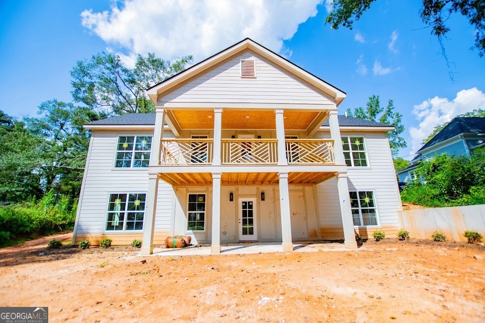 Beautifully DESIGNED, carefully crafted NEW CONSTRUCTION home with nearly 3000 sq ft total with a full unfinished basement on a quiet street with NO HOA! Up to $3,500 in buyer incentives with approval of preferred lender! Ask the listing agent for more details. Discover unparalleled quality in this new construction home, where every detail has been thoughtfully designed for luxury, efficiency, and timeless appeal. Gourmet Kitchen with stunning Calcutta ultra quartz counters with FULL matching backsplash, SOLID WOOD cabinets with dovetail soft-close drawers, and a huge island perfect for entertaining. High-end finishes, with 12-18ft ceilings, 8" baseboards, 20MM Andover Hatfield LPV flooring, matte black lighting and hardware throughout, chrome Delta/Kohler plumbing fixtures, and stainless steel appliances for a sleek, modern look. Built with superior materials, like the 2x6 framing, and attention to energy efficiency, like concrete fiber siding & soffit, energy-efficient Pella windows, spray foam insulation, encapsulated crawlspace, and a dual-zoned HVAC system. This home is a unique design, with 3 bedrooms, 2 baths, ranch-style home on a full unfinished basement to give you room to grow and expand. Gorgeous covered porch on the back and covered patio below to enjoy nature while you sip on coffee or afternoon tea. Quiet and convenient, nestled on a peaceful street, walking distance to downtown Bowdon. *Eligible for no money down loan* ***3 other exquisite homes to choose from*** Schedule your private tour today!
