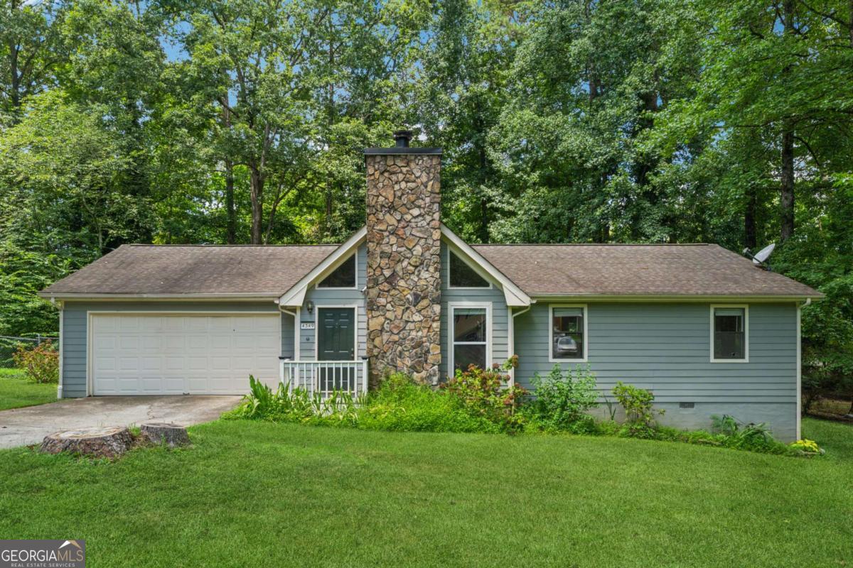 This well-maintained home features wood-look tile flooring, a spacious living room with vaulted beamed ceiling and stone fireplace, and a modern kitchen with stainless steel appliances and a large walk-in pantry. Enjoy a dedicated laundry room, 2-car garage, and a fenced backyard with a large deck-perfect for relaxing or entertaining. Located in the Norris Lake community with access to a boat slip, pool, playgrounds, tennis courts, walking trails, and more-all just minutes from shops and dining.