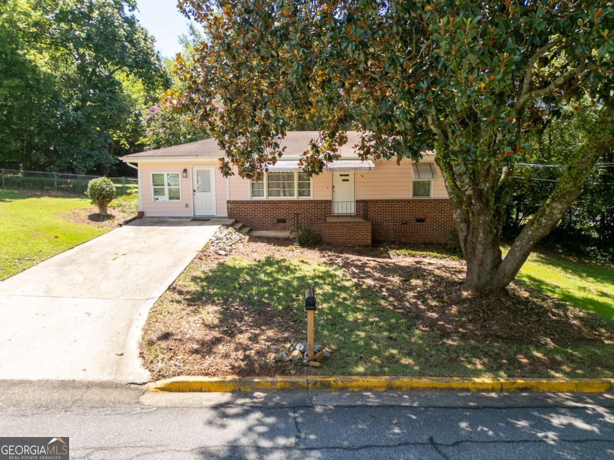 Investors Dream! This charming 3 bed 2 bath ranch in the heart of Athens and UGA is your perfect investment property! Sitting on over .25 of an acre, with a fully fenced in backyard, offering privacy as well as space for an accessory dwelling unit (ADU). The third bedroom suite with a private bath is complete with a coffee bar and a small living area, and can be privately accessed. Just minutes from Downtown Athens shopping, dining, nightlife, and UGA and Sanford Stadium as well as the Firefly Trail - making this home ideal for game days, convenient access to UGA and all recreation that Athens has to offer. Dont miss this opportunity, schedule a showing today!