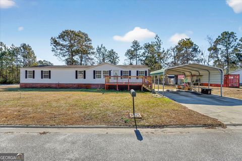 Photo of 124 Willow Lane NE, Ludowici, GA 31316 (MLS # 10697496)
