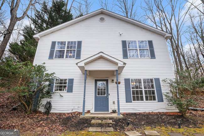 This traditional style home has 2 bedrooms, 1 full bathroom and 1 half bathroom. It is the perfect starter home which has been well maintained. The area around Old Still Trail in Gainesville, GA, is known for its proximity to Lake Lanier, offering residents opportunities for easy lake access and recreational activities. The Forsyth County School District is known for its top ranked school system and has a 5-Star rating. Make sure you put this property on the list to visit.