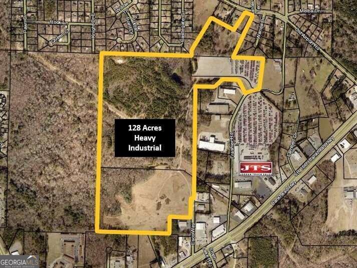 Rare heavy industrial opportunity with three points of access and all utilities available. This 128+/- Acres tract is zoned M-2 Heavy Industrial and is located inside the city limits of Carrollton Georgia. Easy access to Hwy 166 and only 15 miles to I-20 in Villa Rica. Priced at $55,000 per acre for the 128 acres. Will subdivide, but the price will adjust on any subdivision. Available utilities are subject to an independent verification