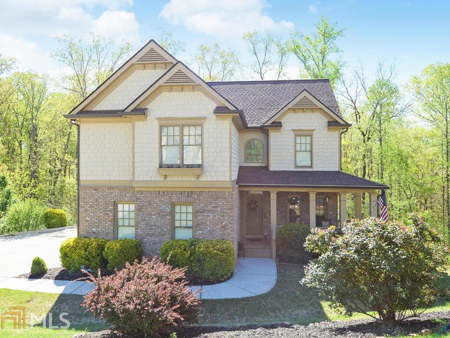 Welcome home to this charming 3br/2.5ba home with new flooring on the main level; new roof and 2 year old HVAC. All countertops are granite throughout the house; master with trey ceilings; large master bath with dbl vanities, separate garden tub/shower; laundry room is up so no walking up and down stairs with laundry baskets! Full unfinished basement stubbed for bath perfect for a man cave, game room or play room; when facing the house the area to the right is part of the property - there is no lot between this home and the neighbors. Creek along back of the property.
