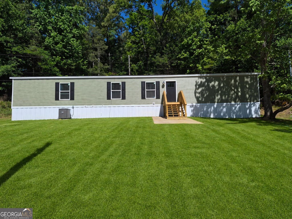 Photo of 26 Club Circle, Ellenwood, GA 30294 (MLS # 10825295)
