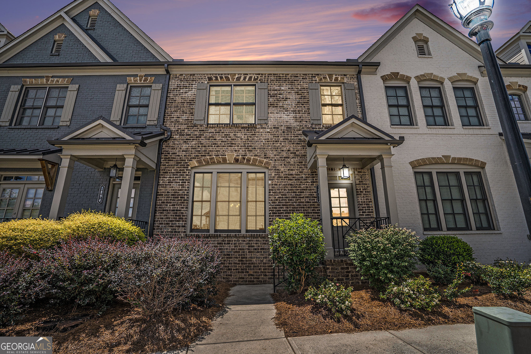 Welcome to the best work-life-work-play location in the city: Skyland Brookhaven. This is a three-bedroom, 3.5 bathroom townhome with a basement-interior design & paintings by Marguerites on Dresden. Step into a townhome designed with sophistication and elegance - this spacious residence is in the highly sought-after Skyland Brookhaven community. Ideally positioned, this home is surrounded by lush green spaces. Offering great views of the neighborhood. As you step inside the open concept living area, take note of the hardwood flooring throughout the home, the built-in bookcase, the fireplace, and the grass cloth wallpaper in the bar. A gourmet kitchen with stainless steel appliances, a custom vented hood, a gas range, and subway tile backsplash, featuring shaker-style cabinets, an upgraded Nest thermostat, and custom electronic window shades. A large island is perfect for gathering around and entertaining. Upgraded from builder grade to luxury lighting throughout the home. Step out onto your deck for morning coffee or to relax in the evenings. Powder room: upgraded lighting and mirror. Custom runners are installed on all stairs, along with a matching piece on the landing of the entire top floor, as well as the kitchen. Primary ensuite, upgraded fixtures, lighting, mirrors. Primary bedroom: custom-built closet designed by Artisan Closets, double-tray ceiling. Two other spacious bedrooms are on the second floor. Enjoy the second-floor laundry as well. The lower-level features a full bathroom and a basement that can be customized for your specific design, including office space, a gym, or a playroom. Sklyland Brookhaven offers a clubhouse, swimming pool, playground, walking trails, and a dog park. The Skyland Brookhaven community provides an outstanding work-life balance, with easy access to I-75 / 85, Markets, doctors, Recreation, and nightlife. Be the first to take in what this home has to offer.