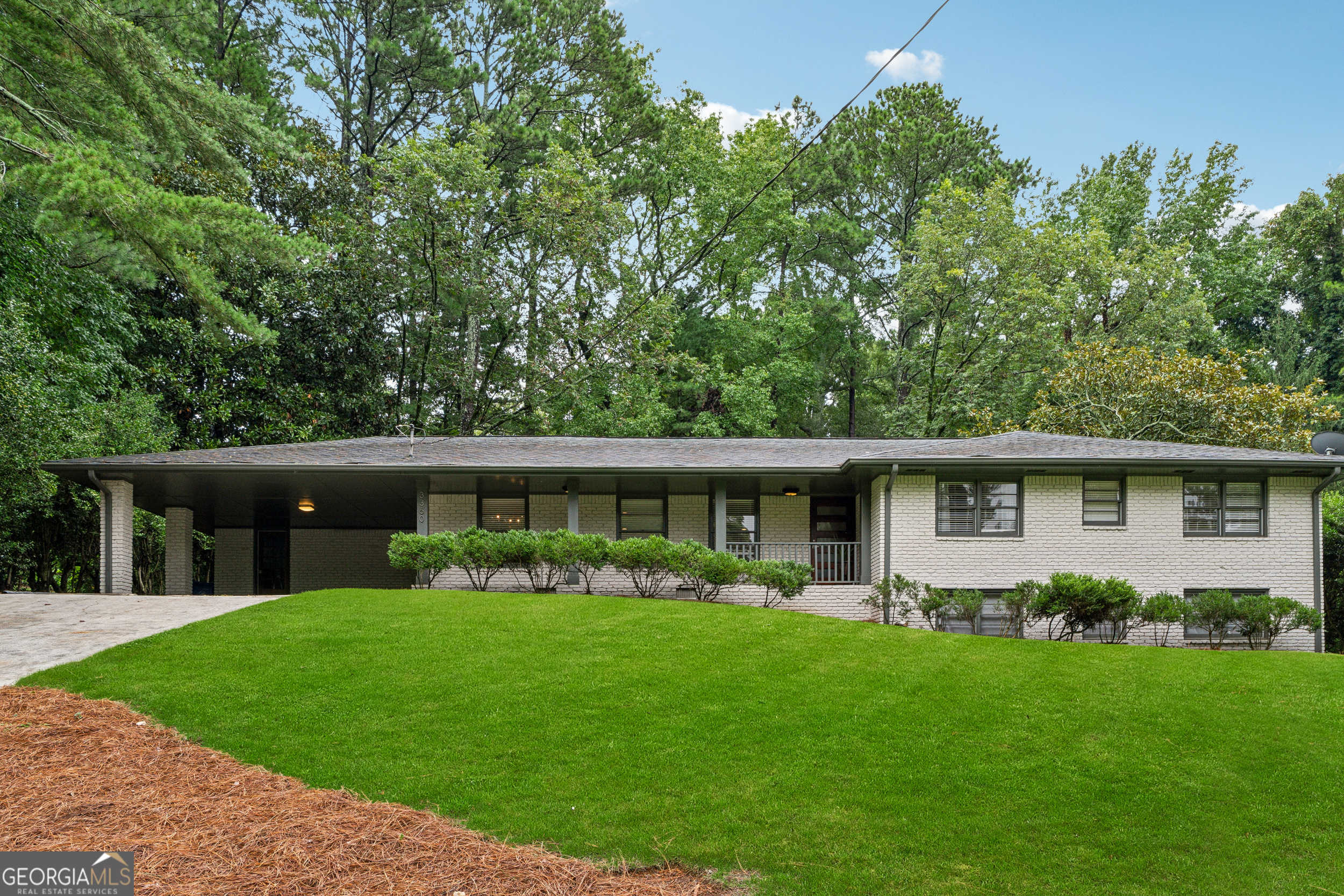 This stylish 1960s Northcrest ranch blends timeless charm with all the modern updates. Hardwood floors, designer lighting, neutral paint colors, and an open, airy layout create a warm, cohesive vibe throughout. A classic 4 Bedroom/2 Bathroom Ranch Style home = one level living with a Master on the Main! The updated kitchen features quartz countertops, custom cabinetry and stainless-steel appliances, and flows easily into the living and dining areas - ideal for everyday living and entertaining. A fully renovated bathroom (2022) adds move-in-ready appeal, and recent upgrades to plumbing & electrical systems provide added value and peace of mind. Walk through the sliding glass doors to enjoy your morning coffee on the spacious screened-in porch overlooking a private, fenced backyard. The large partially finished basement offers endless potential, storage and plenty of space for a playroom, man cave, home gym and a workshop. This home checks all the boxes! Set in the Historic Northcrest neighborhood with access to the Swim & Tennis club, you can live in a neighborhood known for its mid-century character and strong sense of community! You'll also love the location - just minutes from downtown Chamblee and Tucker, the growing Assembly Yards development, and the exciting mixed-use site under construction at Buford Highway. Convenient to shopping, dining, and major highways, this home combines comfort, style, and an unbeatable location. Don't miss this opportunity, it's a must see!
