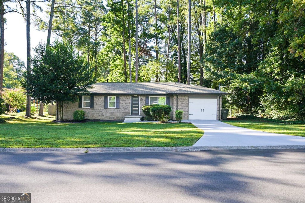 Photo of 586 E Glochester Place NW, Norcross, GA 30071 (MLS # 10854636)
