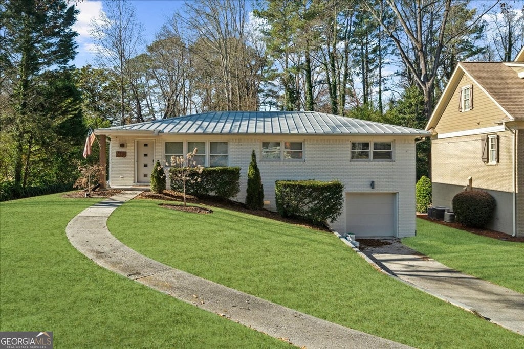 Photo of 2420 Cove Circle NE, Brookhaven, GA 30319 (MLS # 10785963)