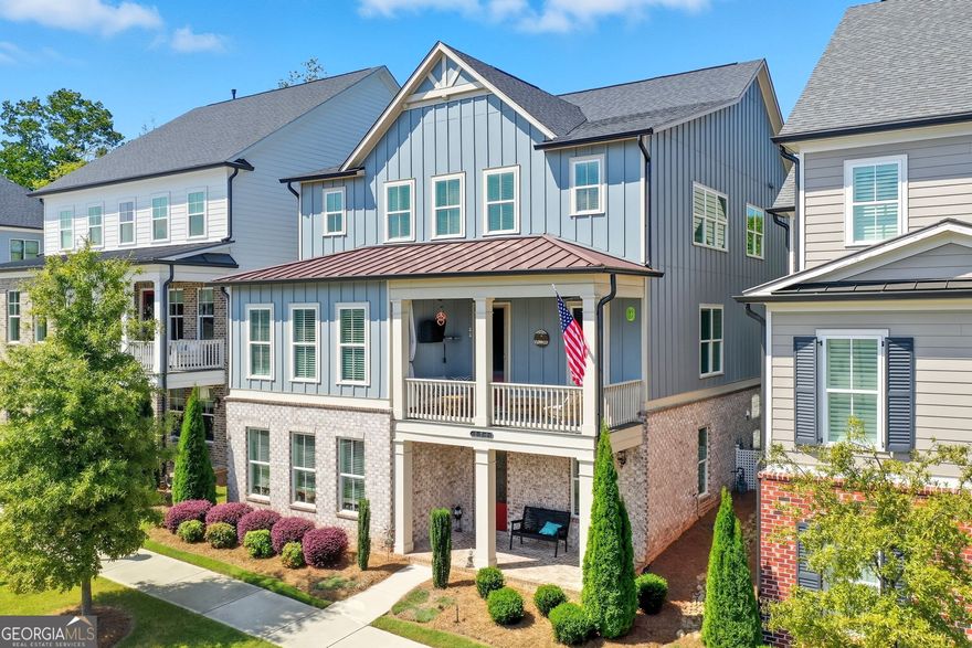 Nearly new, large single-family home in the highly desirable downtown Woodstock neighborhood of Inwood. The home boasts a prime location with easy access to major roads like 575, and popular amenities including the Atlanta Outlet Mall, Costco, restaurants, shops, and walking trails just a short walk or golf cart ride away. Key features include: Multiple levels with a street-level entrance leading to a recreation room, bedroom, full bathroom, and additional storage. Main level with an oversized two-car garage, front and rear porches, an office, and an open-concept living and dining area, aundry room and powder room. Gourmet kitchen with plenty of cabinet space, a large island, and walk-in pantry, perfect for entertaining. Upstairs loft suitable for a family entertainment or reading nook. Spacious primary suite with two walk-in closets, a luxurious ensuite with double vanity, soaking tub, and oversized shower. Additional 3 large bedrooms, a Jack and Jill bathroom, and a full hallway bath on the upper level. The home has been lovingly maintained by the original owner and is move-in ready. Walk to the community pool across the street. It offers a blend of modern comfort, ample space, and a vibrant downtown lifestyle with new developments on the horizon. Don't miss all the neighborhood amenities including resort like swimming pool and pavilion, 2 dog parks and a mini amphitheater and green space. An ideal investment opportunity with easy showings-schedule now!