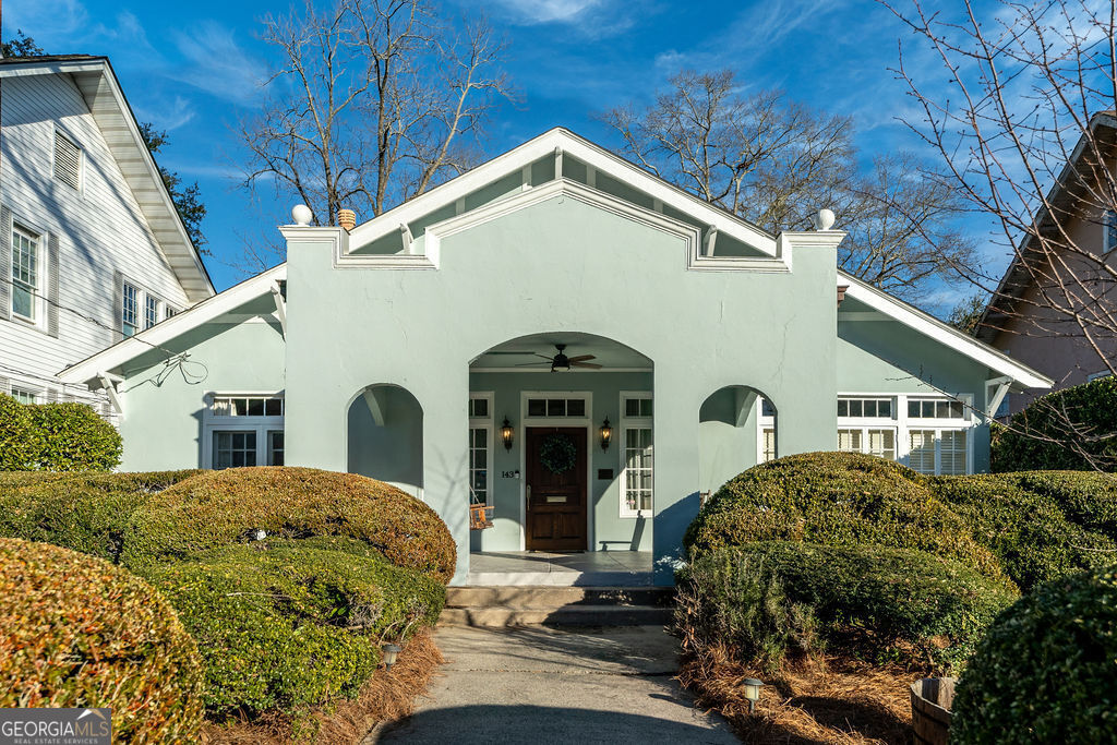 This is the one! A four bedroom, craftsman home located on one of the most charming streets in the popular Historic Vineville Neighborhood!! Freshly painted; this home features a primary suite, living room, den, dining room (w/French doors to the porch), eat-in-kitchen, guest bedroom/sunroom, upstairs secondary bedrooms, beautiful landscaping, two car carport. This home has generous space for everyone in the family and entertaining. Go for an evening stroll or wave to neighbors from the porch in this active family friendly neighborhood. Call today!