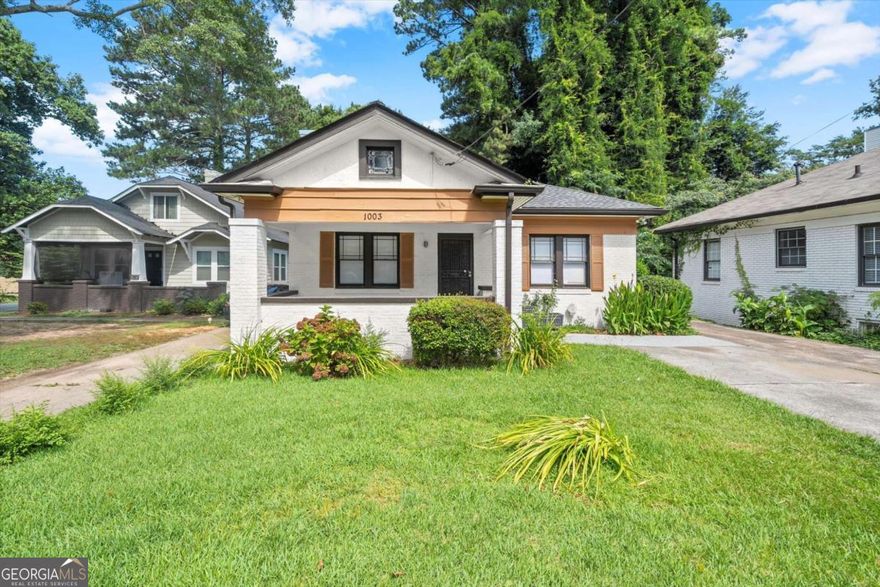 Home offers 100% financing for qualified buyers with our preferred lender** This beautifully renovated 3 bed, 2 bath bungalow is full of charm, space, and light-perfect for first-time buyers or savvy investors! Step inside to original hardwood floors, a cozy painted brick fireplace, and a modern, open layout that feels fresh and welcoming. You'll love the flow from the living room to the dining space and into the updated kitchen, making everyday life easy.    The primary suite offers privacy and comfort, while the additional bedrooms are ideal for guests, a home office, or your dream workout space. Both bathrooms are fully updated with custom tile and stylish finishes.    Outside, enjoy your morning coffee on the classic front porch, or entertain in the large backyard that's ready for pets, gardening, or even future expansion.    Located on a quiet, tree-lined street just minutes from the BeltLine, breweries, restaurants, and downtown Atlanta-you get the best of both convenience and community.    Whether you're house-hunting for the first time or looking for an income-generating investment, this one is move-in ready and full of potential. Don't wait-schedule your tour today