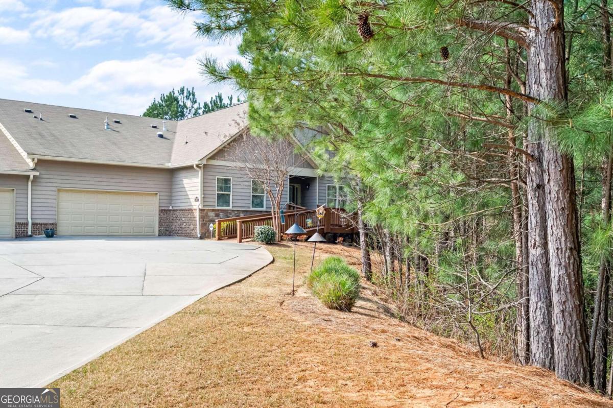 Ladies and gentlemen, welcome to the epitome of suburban paradise! Nestled within the prestigious gated community of Marietta, prepare to be dazzled by this captivating one-level patio home! Picture this: You step through the door and are immediately embraced by an atmosphere of tranquility and elegance. With its nature-inspired design and breathtaking view of lush greenery, this home is a sanctuary for the soul! But wait, there's more! Step into the spacious living area and feel the warmth radiating from the cozy fireplace, just waiting to envelop you on those chilly evenings. And the open floor plan? It's a game-changer, effortlessly connecting the living room to the kitchen, making entertaining an absolute breeze! Let's talk kitchen, shall we? Prepare to be enchanted by the beautiful wooden design, complete with pendant lights, a double fridge, and all the bells and whistles you could ever dream of! Cooking has never felt more luxurious. But the pice de rsistance? The master bedroom! A true haven, boasting a walk-in closet and a private ensuite bathroom fit for royalty! And don't even get me started on the additional bedroom Co spacious, airy, and flooded with natural light, they're the stuff of dreams! You can't forget about the full walkout basement with unbelievably high ceilings!! But wait, it gets better! Venture outside to discover a meticulously landscaped garden, perfect for soaking up the sun or hosting unforgettable gatherings with loved ones. And that deck? It's practically calling your name, begging to be adorned with a morning coffee or the sizzle of a barbecue grill! So, my friends, don't let this opportunity slip through your fingers! Come and experience the magic of Marietta living for yourself Co because paradise awaits, and it's calling your name!