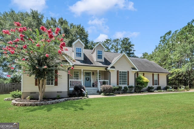 Southern Charm Meets Modern Comfort | 3BR/2BA + Bonus | Updated Beauty with Timeless Appeal Welcome to a home where character and comfort come together in the most delightful way. This charming 3-bedroom, 2-bathroom home is nestled in a desirable, community-oriented neighborhood known for its Halloween hayrides and magical Christmas sightseeing-a true hallmark of Southern hospitality. Step inside to discover a thoughtfully designed layout with warm wooden ceilings in kitchen and bathrooms as well a sunken living room that adds architectural flair and a cozy, intimate vibe. The living area flows seamlessly into an updated kitchen that feels straight out of a Southern Living magazine-complete with granite countertops, and modern appliances that blend beautifully with the home's rustic touches. Retreat to the primary suite, where you'll find a peaceful haven featuring an elegant clawfoot tub, updated fixtures, and a tranquil, spa-like atmosphere. Two additional bedrooms offer comfortable space for guests or family, while the upstairs bonus room provides the perfect spot for a home office, hobby space, or guest retreat. Outdoors, enjoy a welcoming front porch and a spacious backyard ideal for entertaining, gardening, or simply soaking in the neighborhood charm. Highlights Include: Sunken living room with warm wood detail and fireplace Updated kitchen Primary suite with clawfoot tub and seperate shower Beautiful wooden ceilings and cozy finishes Upstairs bonus room/flex space Close proximity to local schools & shopping Community traditions that create lasting memories This home offers not just a place to live, but a lifestyle deeply rooted in Southern charm, neighborly connections, and everyday comfort. Schedule your private showing and come experience life in the heart of a true Southern community.