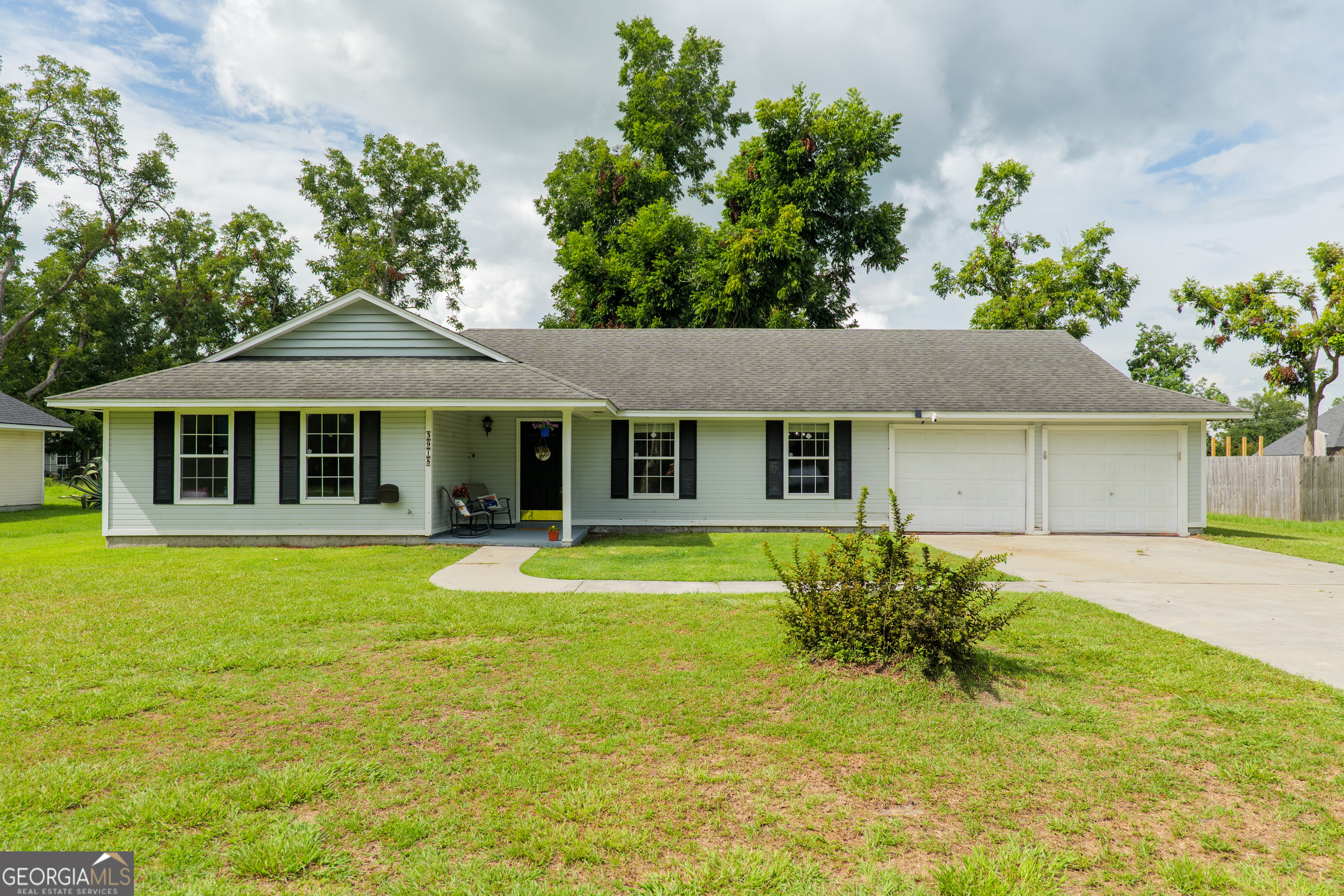 This charming 3-bedroom, 2-bathroom home offers comfort, convenience- just 8 minutes from Moody Air Force Base, and room to spread out. With a roof and HVAC only 4 years old, you can enjoy peace of mind for years to come. Step inside the freshly painted interior and be welcomed by a versatile great room-perfect as a formal living or dining space-flowing seamlessly into the kitchen, breakfast nook, and a cozy living room with fireplace. The kitchen is equipped with a brand-new sink, dishwasher, and refrigerator, and the breakfast nook features beautiful windows overlooking the backyard, creating a bright and inviting space to start your day. The spacious bedrooms offer plenty of room to relax, while the two-car garage and extra-long driveway provide ample parking. The front and back porches are ideal spots to sip your morning coffee, take in the peaceful surroundings, and watch nature. The large backyard features mature trees, including a fruit-bearing tree, offering beauty and shade. With no HOA, you're just minutes from shopping, dining, and groceries-making everyday living a breeze.