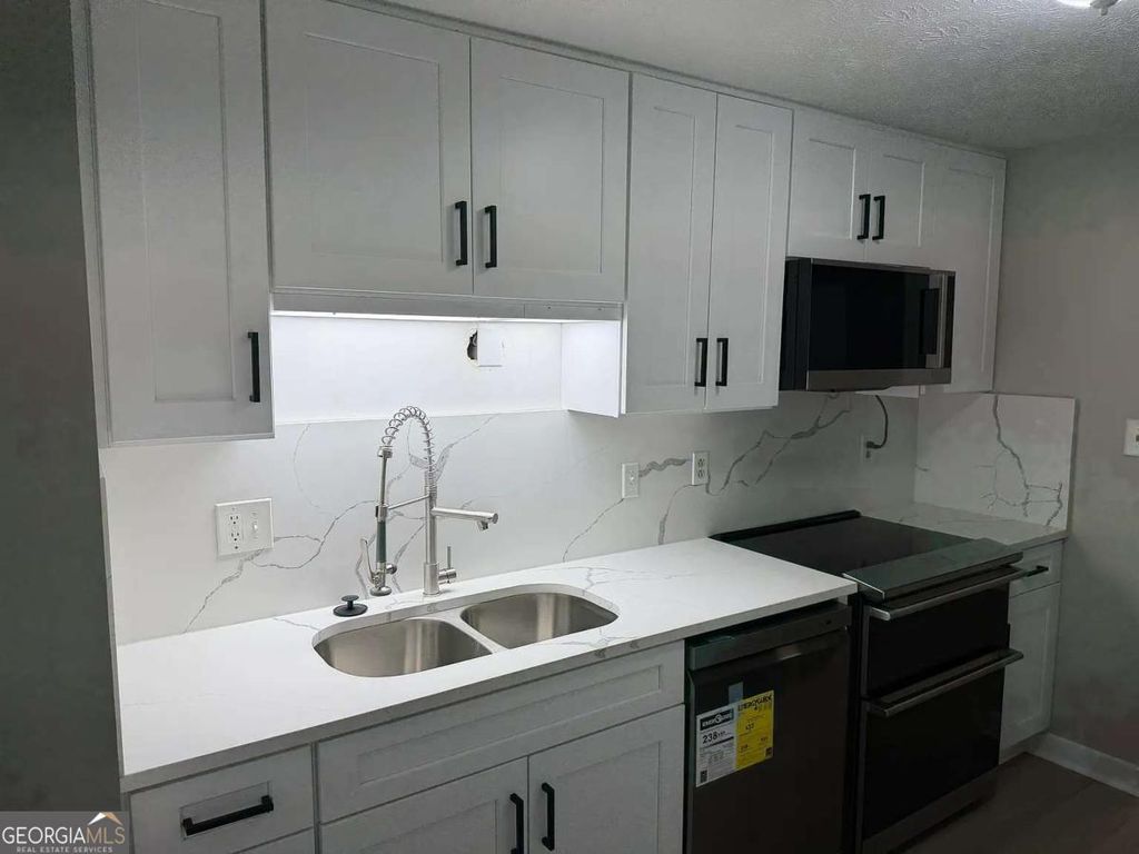 Photo of 418 Engle Drive, Tucker, GA 30084 (MLS # 10728107)