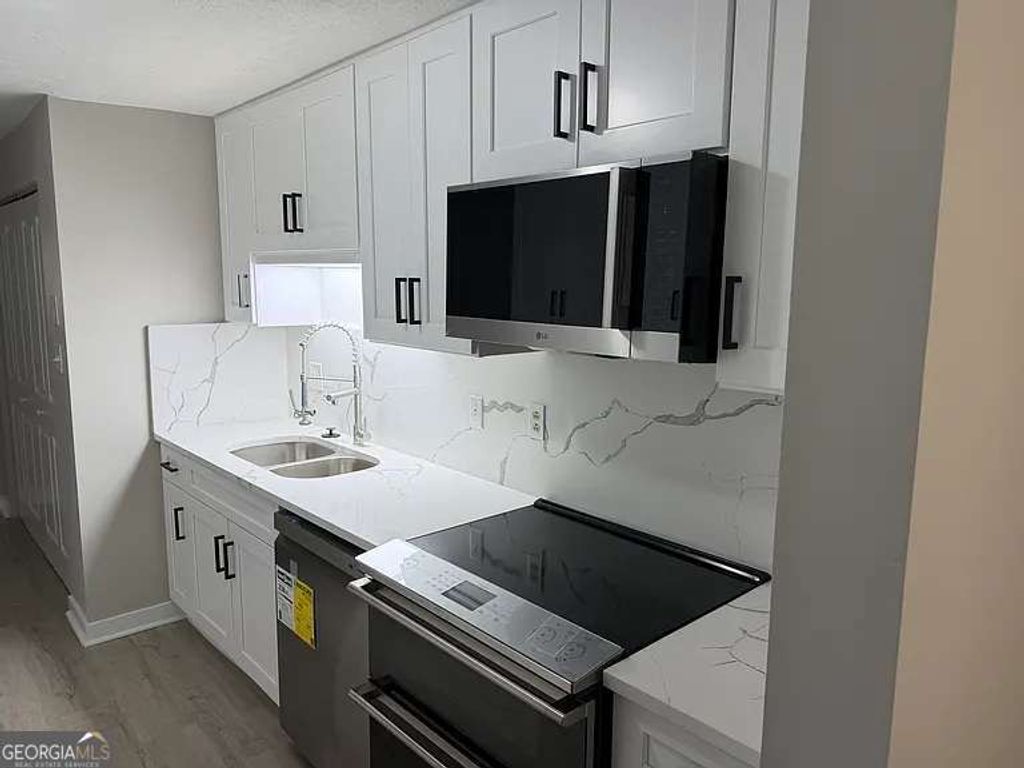 Photo of 418 Engle Drive, Tucker, GA 30084 (MLS # 10728107)