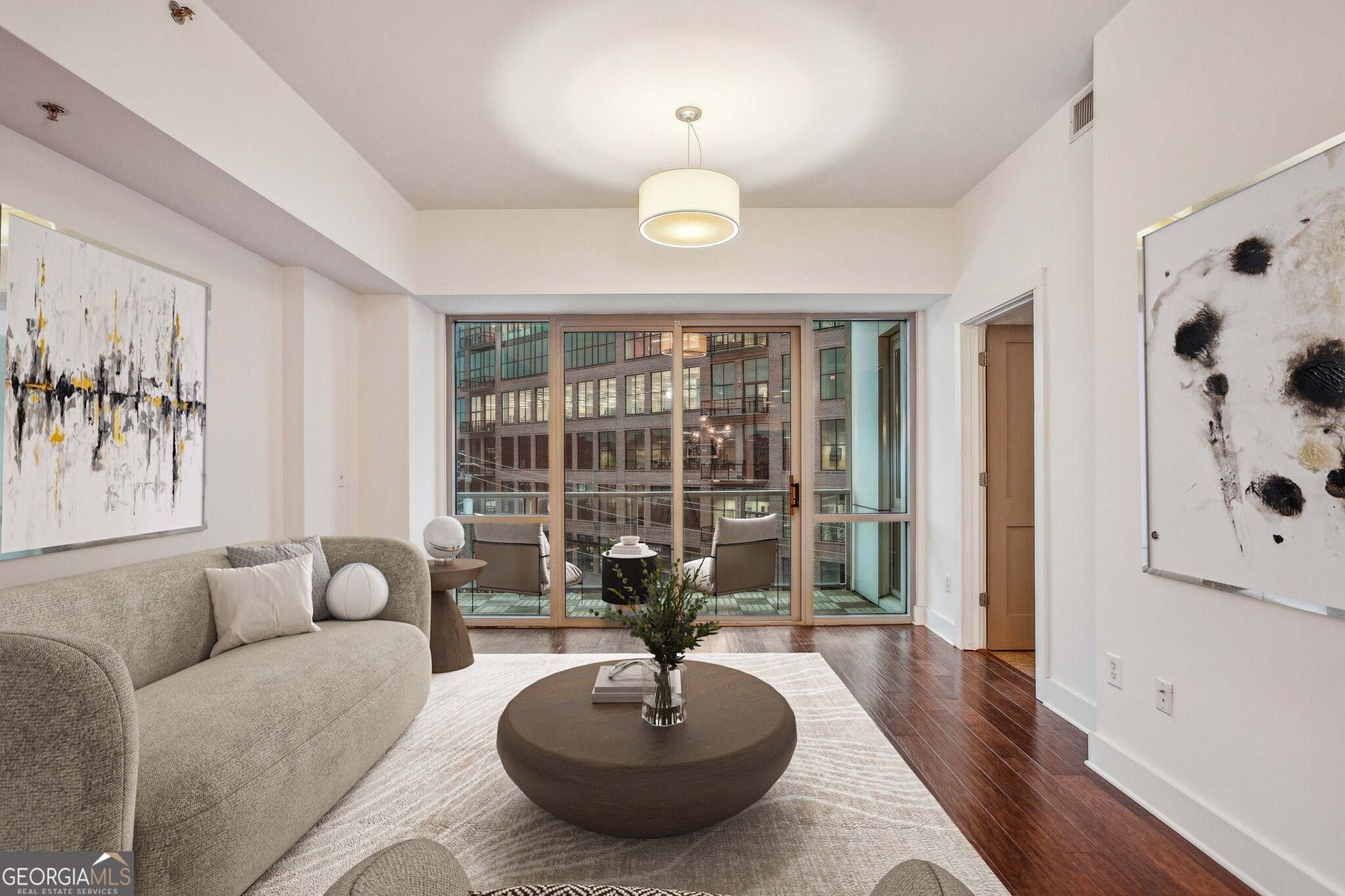 Westside Best-Side! In the HEART of the Westside, you'll find this Spacious, Light-filled Condo in White Provision. A friendly Concierge will greet you before you head up to unit 408. Step inside to find an Open Floorplan with Hickory Hardwoods throughout. The Kitchen is top of the line with a Breakfast Bar Island, gas range, and Stainless Steel Appliances. The Dining Room opens to the Living Room with City Views right next to the new Interlock ATL. This layout is perfect for Hosting and Entertaining Friends and Family! The Primary Bedroom features Floor-to-Ceiling Windows, a Spa-like Dual Vanity Bathroom with Marble Flooring, Soaking Tub, Frameless Standing Shower, and Walk-in Closet. A Spacious Bonus Room is perfect as an Office, Additional Living Space, or Guest Bedroom! This unit comes with TWO Secured Covered Parking Spaces only steps from the Condo. White Provision Amenities include a Concierge, Lap Pool, Fitness Center, Grilling Area, and even a Guest Suite! The amount of Atlanta's favorite Shopping, Dining, and Entertainment options just outside your doorstep is too much to mention, but include TWO One-Star Michelin Restaurants (Muj? and Hayakawa), Marcel, West Egg Caf , Puttshack, Cooks & Soldiers, and so much more! Easy Access to 75/85 for any commuting needs. You'll love living in Atlanta's Hottest Neighborhood!