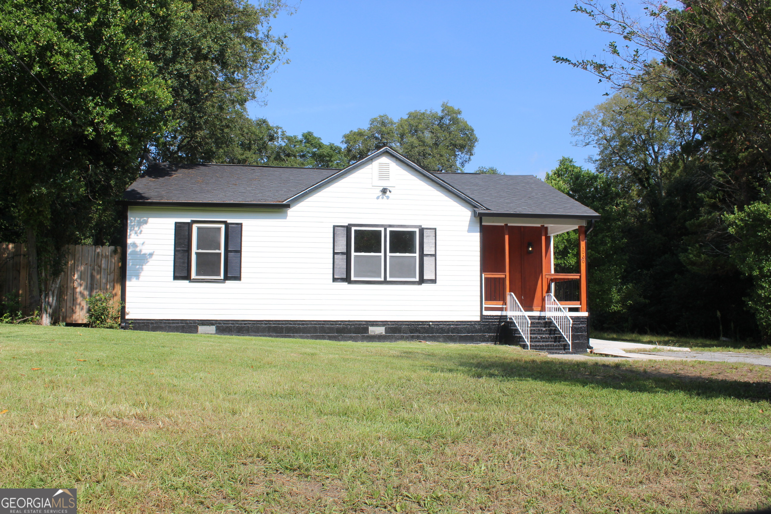 Discover vintage charm with modern flair in this beautifully updated 3-bedroom, 2-bath ranch-style home. Spacious open floor plan with hardwood floors and abundant natural light. Renovated kitchen with stainless steel appliances, stylish bathrooms with updated fixtures. Large fenced backyard and covered front porch. Minutes from downtown Macon, Mercer University, and Atrium Health Navicent. Easy access to I-75, local shopping, dining, and entertainment.