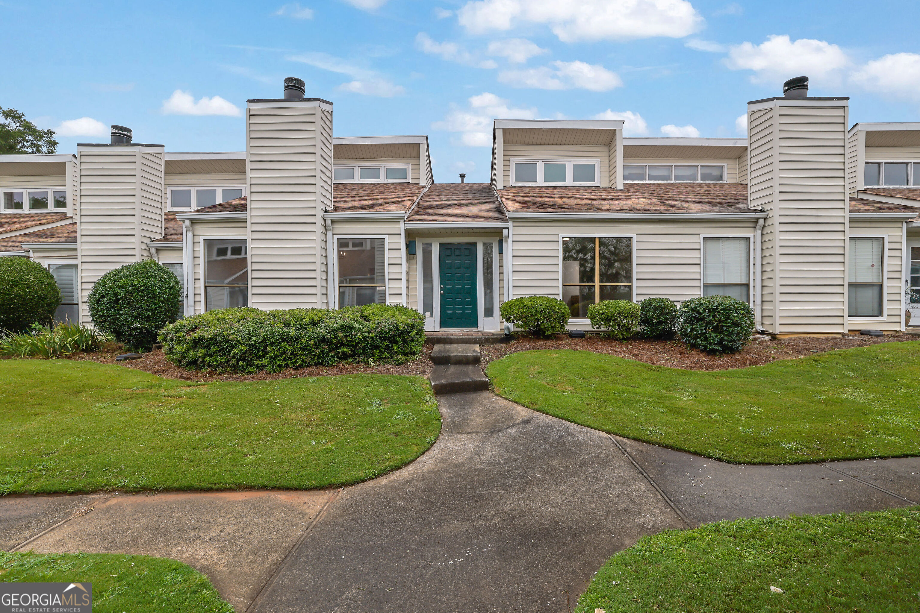 Stunning, Fully Renovated Single-Level Condo in Prime Marietta Location! This move-in-ready gem has been meticulously renovated from top to bottom with high-end finishes. The kitchen features brand new shaker style cabinetry with soft-close drawers & cabinets, sleek quartz countertops, and a marble tile backsplash. Enjoy soaring ceilings and abundant natural light in the spacious main living area. The master bedroom boasts a luxurious ensuite bathroom with a fully tiled walk-in shower, modern vanity, and new fixtures. Two additional bedrooms offer direct access to a private patio through NEW sliding glass doors. Additional updates include NEW LVP flooring throughout, FRESHLY painted interior, NEW interior doors & hardware, NEW light fixtures, NEW plumbing fixtures, NEW appliances. Additional highlights include an attached 2-car carport, newer HVAC and water heater. Located in a beautifully maintained community with two pools, tennis courts, and pickleball. HOA includes water, sewer, trash, and pest control. Welcome Home! Owner/Agent.