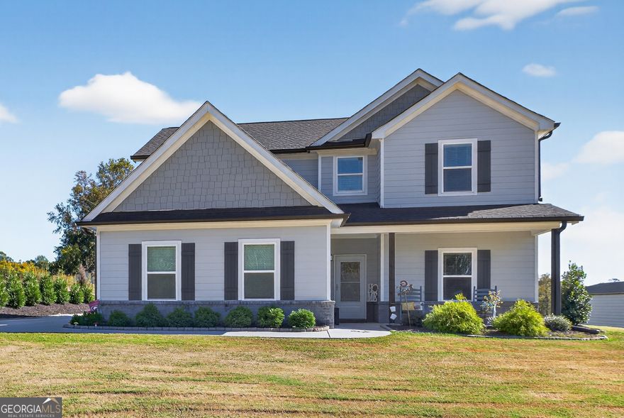 Stunning 4-Bedroom Home in Habersham County over three acres!  Located near Demorest and Clarkesville, this gorgeous property sits on over three acres of land with a tranquil creek at the back. Enjoy convenient access to nearby shopping and amenities.    The open-concept family room features a cozy fireplace and seamlessly connects to the fully equipped kitchen, complete with stainless steel appliances, granite countertops, and a pantry. The main level also includes a spacious master bedroom, boasting an elegant walk-in shower and double vanity.    Upstairs, you'll find a versatile den or multipurpose room, plus three additional bedrooms. For those who love projects or need extra storage, there's a separate 24x36 foot shop with double roll-up doors, partially finished on one side and ideal for a workshop or horse stalls.    Relax on the covered back patio, complete with a fireplace-perfect for watching football games or enjoying the serene surroundings.