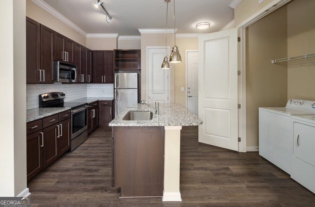 Photo of 306 Ardmore Circle NW #C124, Atlanta, GA 30309 (MLS # 10829089)