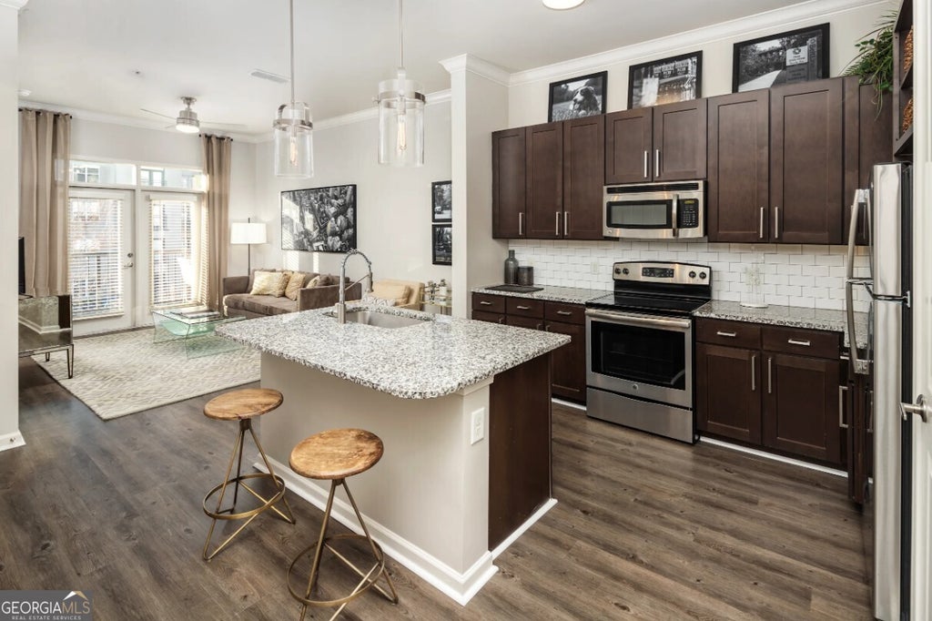 Photo of 306 Ardmore Circle NW #C124, Atlanta, GA 30309 (MLS # 10829089)
