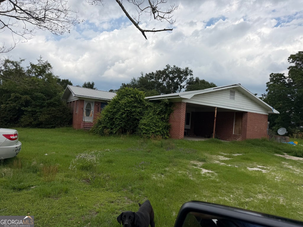 Photo of 1033 S Highway 1, Swainboro, GA 30401 (MLS # 10779175)