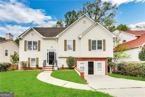 Photo of 5753 Three Lakes Drive, Atlanta, GA 30349 (MLS # 10829855)