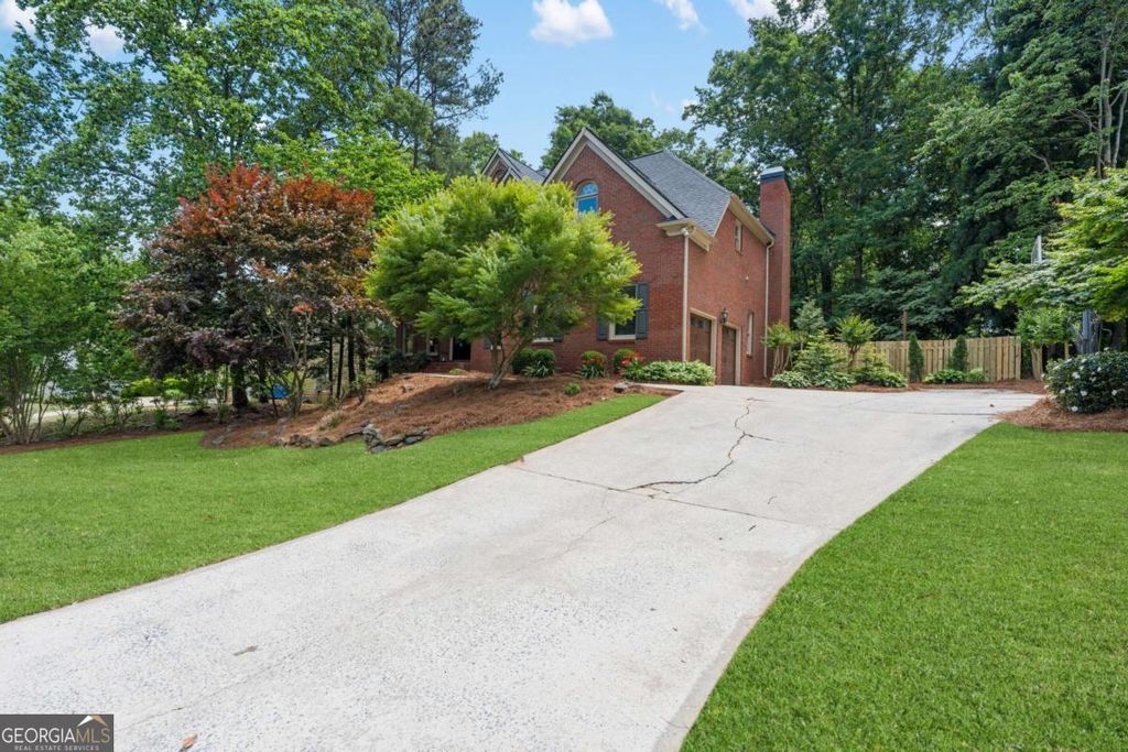 Photo of 1028 Towne Lake Hills E, Woodstock, GA 30189 (MLS # 10761164)