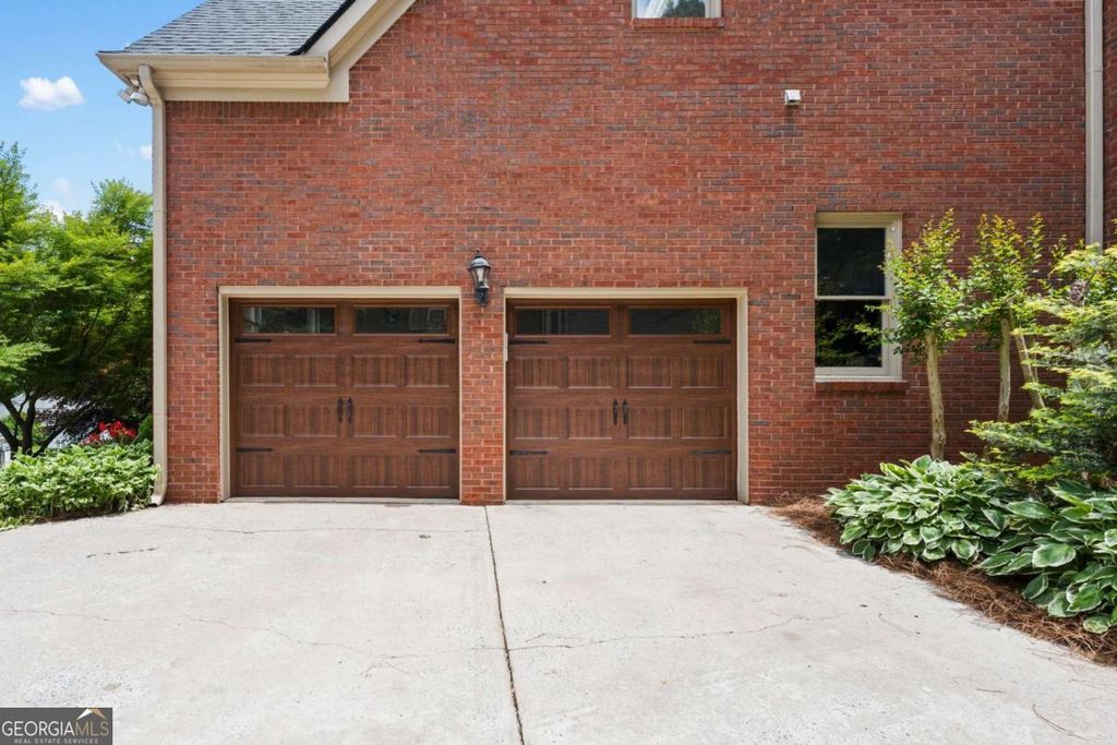 Photo of 1028 Towne Lake Hills E, Woodstock, GA 30189 (MLS # 10761164)
