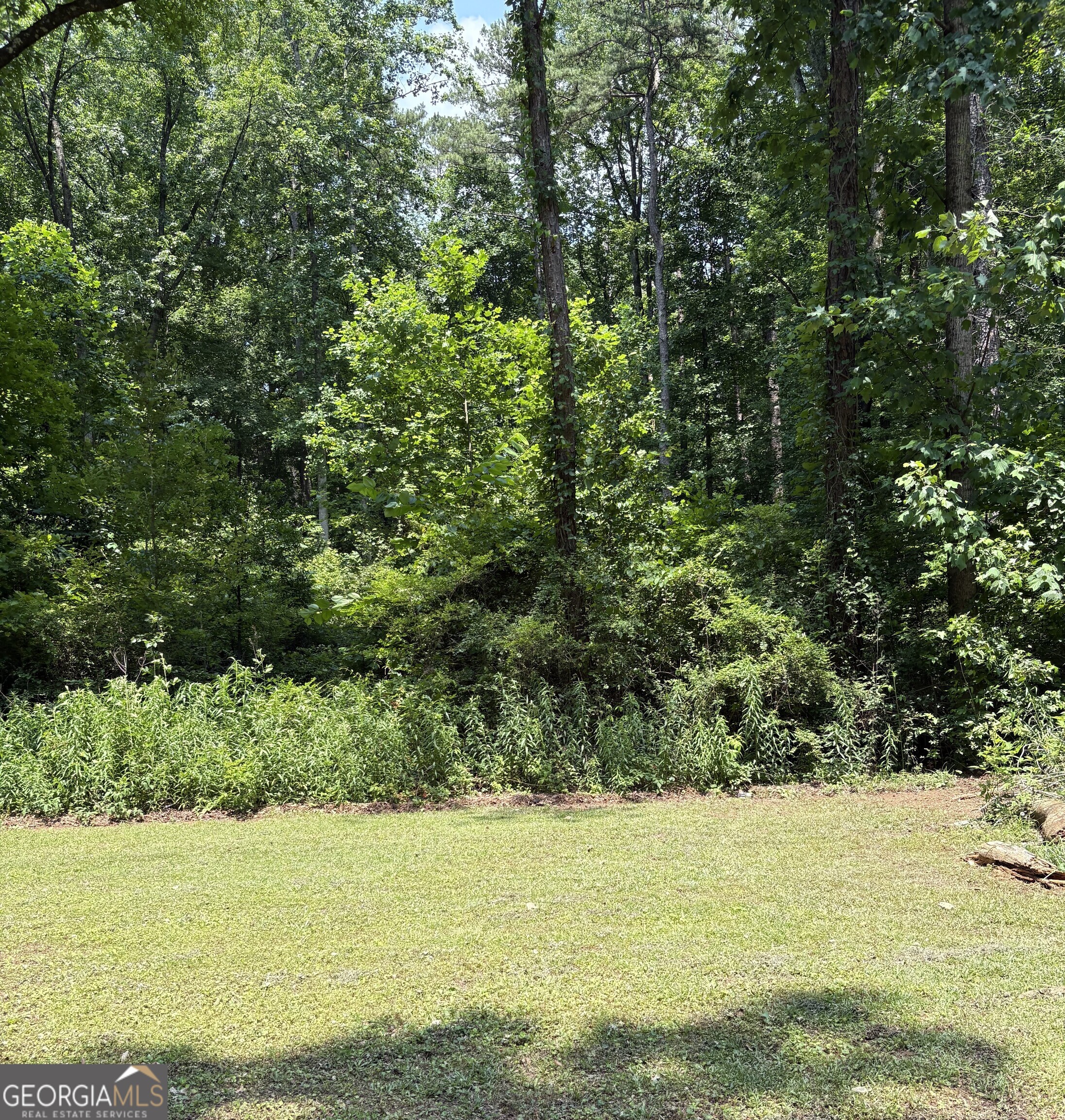 BRING YOUR BUILDER! SEWER AVAILABLE! Awesome opportunity to build your dream home on 4.81 +/- beautifully wooded acres in the heart of Stockbridge, GA.(Henry County) Appx. 453' feet of road frontage that includes both lot tracts A & B! Located near 1-75 and 1-675. Just minutes from Downtown Stockbridge, shopping, parks, library, Stockbridge Amphitheater, Piedmont Henry Hospital, Merle Manders Conference Center, Stockbridge City Hall, Stockbridge Police Dept., five parks and walking trails, a historical district, senior citizen center, plus the Henry County Aquatic Center and Outdoor Water Park (opening soon) Close to the Stockbridge Schools and approx. 20 miles to Downtown Atlanta, 16 miles to Atlanta airport. Rare Opportunity and ready for you to make this Beautiful Lot your own! Bring your builder or we can help you find one! Sewer available!