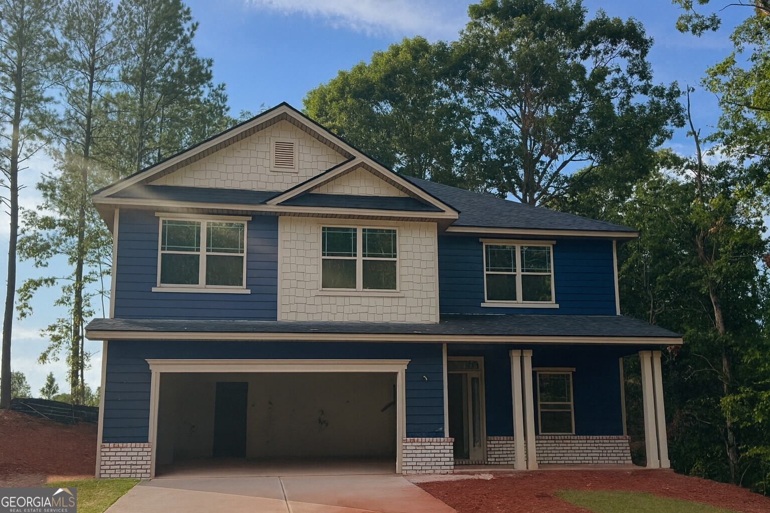 A boiled egg is hard to beat...Just like this beautiful 4 bedroom 2 1/2 bath home! This home is move-in ready! Decorated model of this plan is available for your viewing pleasure. Last model of this floorplan left in most sought out subdivision in Cornelia, Ga! Nestled in the middle of this peaceful neighborhood, this 2,307 sq. ft. residence perfectly blends style, comfort, and modern conveniences. Welcome to 265 Magnolia Villas Drive (Lot 84) boasting 4 spacious bedrooms and 2.5 baths and a bonus storage closet! This property offers everything you need for comfortable living and entertaining. Open concept kitchen/family room has dove gray hardwood soft-close cabinetry, a large attention-grabbing kitchen island upgraded and covered in sleek granite with ample recessed lighting, a deep bowl stainless steel sink with brushed nickel finishes, and a cozy breakfast room makes this space a chef's delight. The primary suite features a separate shower and soaking tub with walk-in closet and spacious room to truly unwind. Laundry room adds convenience and elegance located in the center of all bedrooms on the second floor, so no hauling laundry! This home truly stands out with thoughtful upgrades and a prime location near local amenities. Don't miss your chance to live in this stunning property. Secure your purchase, and secure your peace, with our top-of-the-line warranty! 1 Yr. Builder's Warranty, 2 Yr. Systems Warranty, 10 Yr. Structural Warranty, 2 Pre-Closing Walk Throughs & a Smart Home Switch Package.