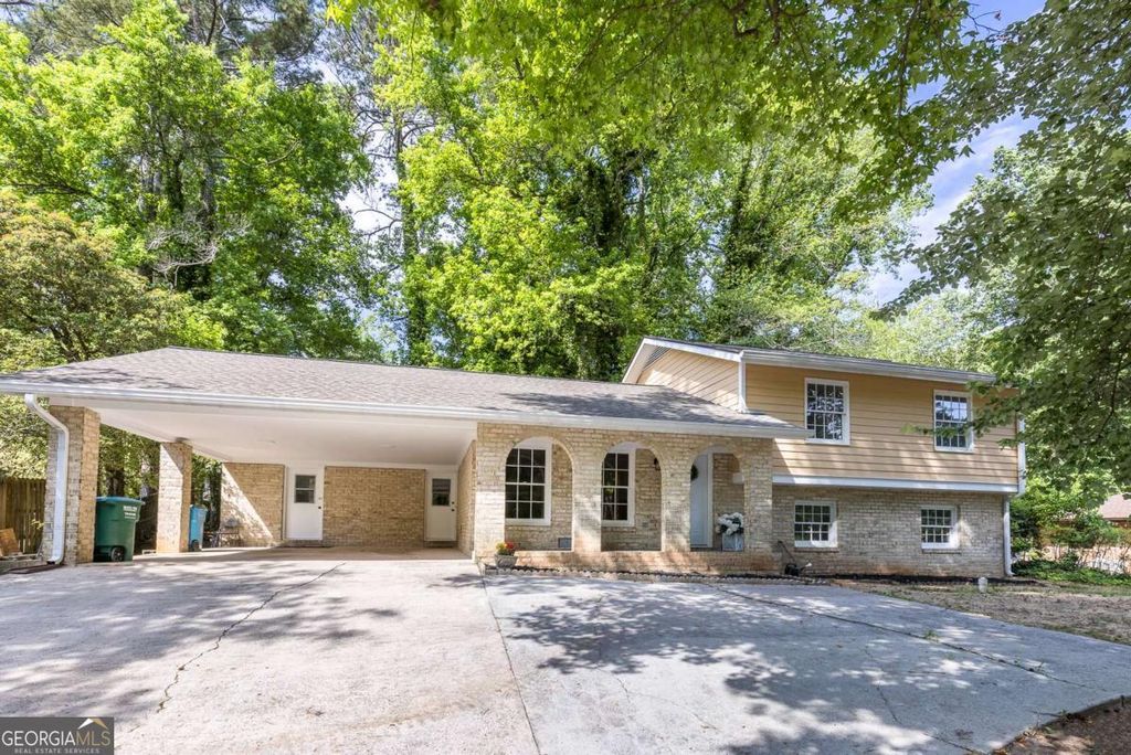 Photo of 383 Ben Avenue SW, Lilburn, GA 30047 (MLS # 10742930)