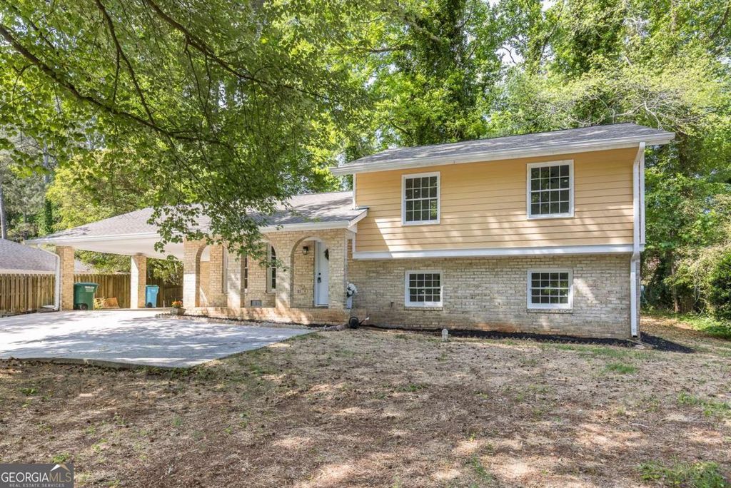 Photo of 383 Ben Avenue SW, Lilburn, GA 30047 (MLS # 10742930)